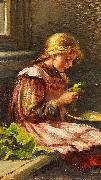 Girl cleaining lettuce